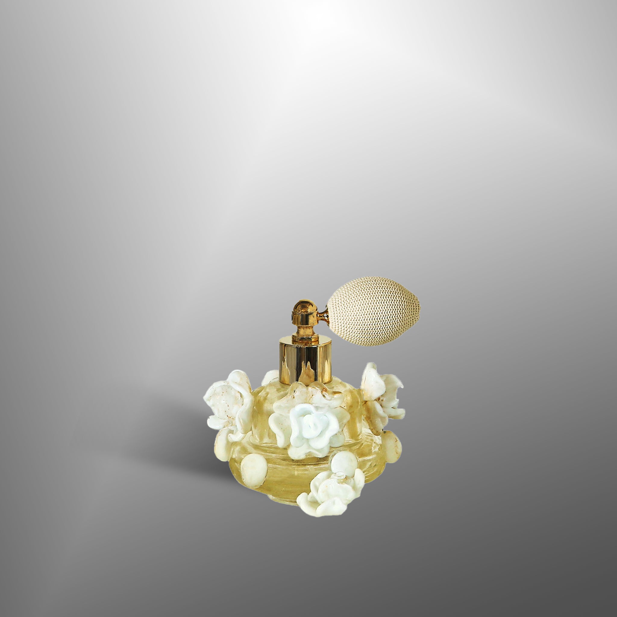 Parfume bottles with white flowers