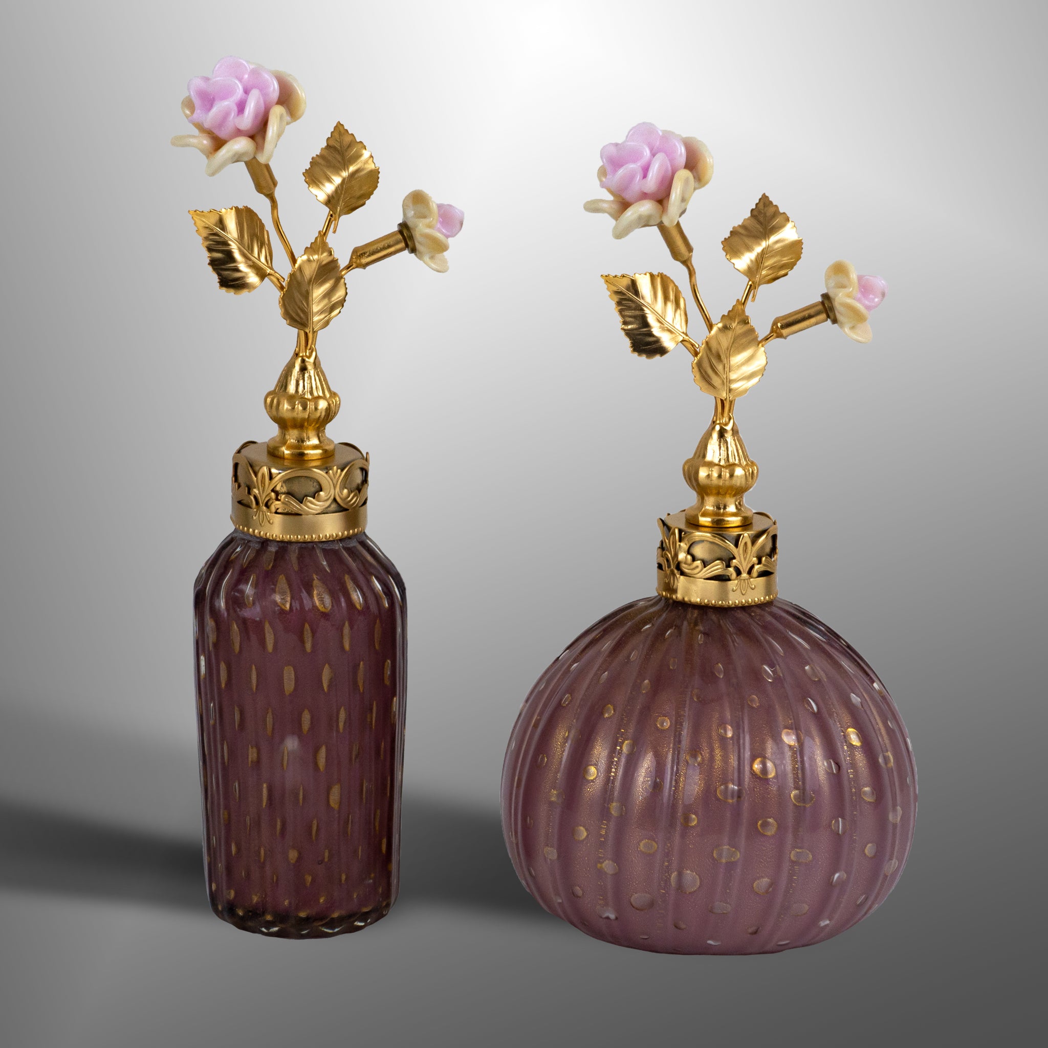 Amethyst parfume bottles with brass details and flowers