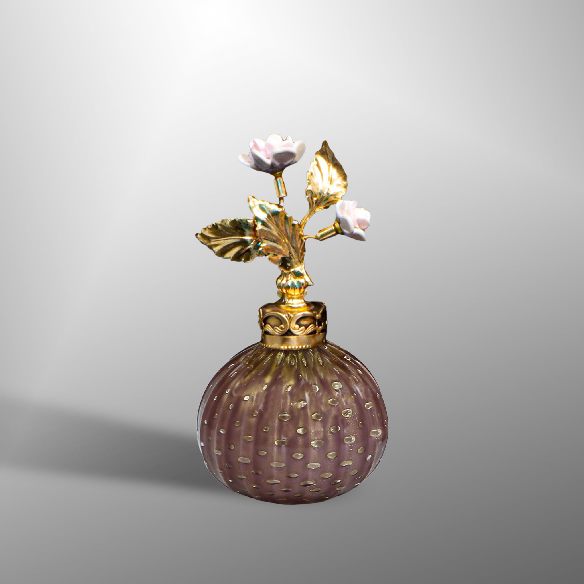 Amethyst parfume bottles with brass details and flowers