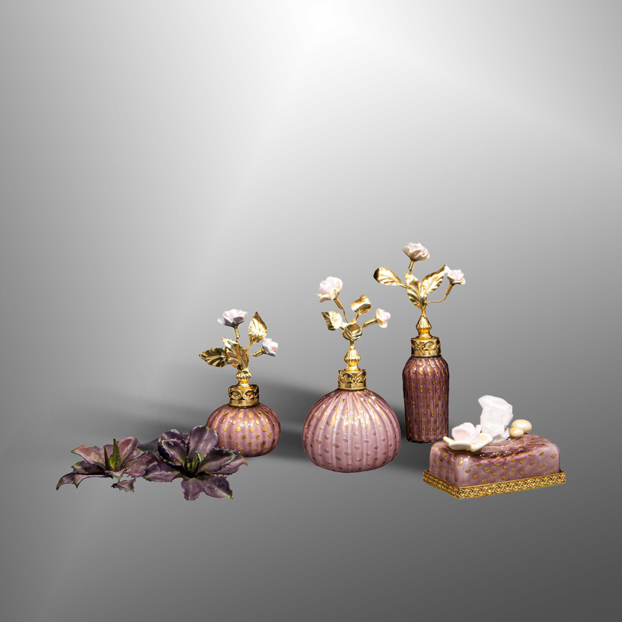 Amethyst parfume bottles with brass details and flowers