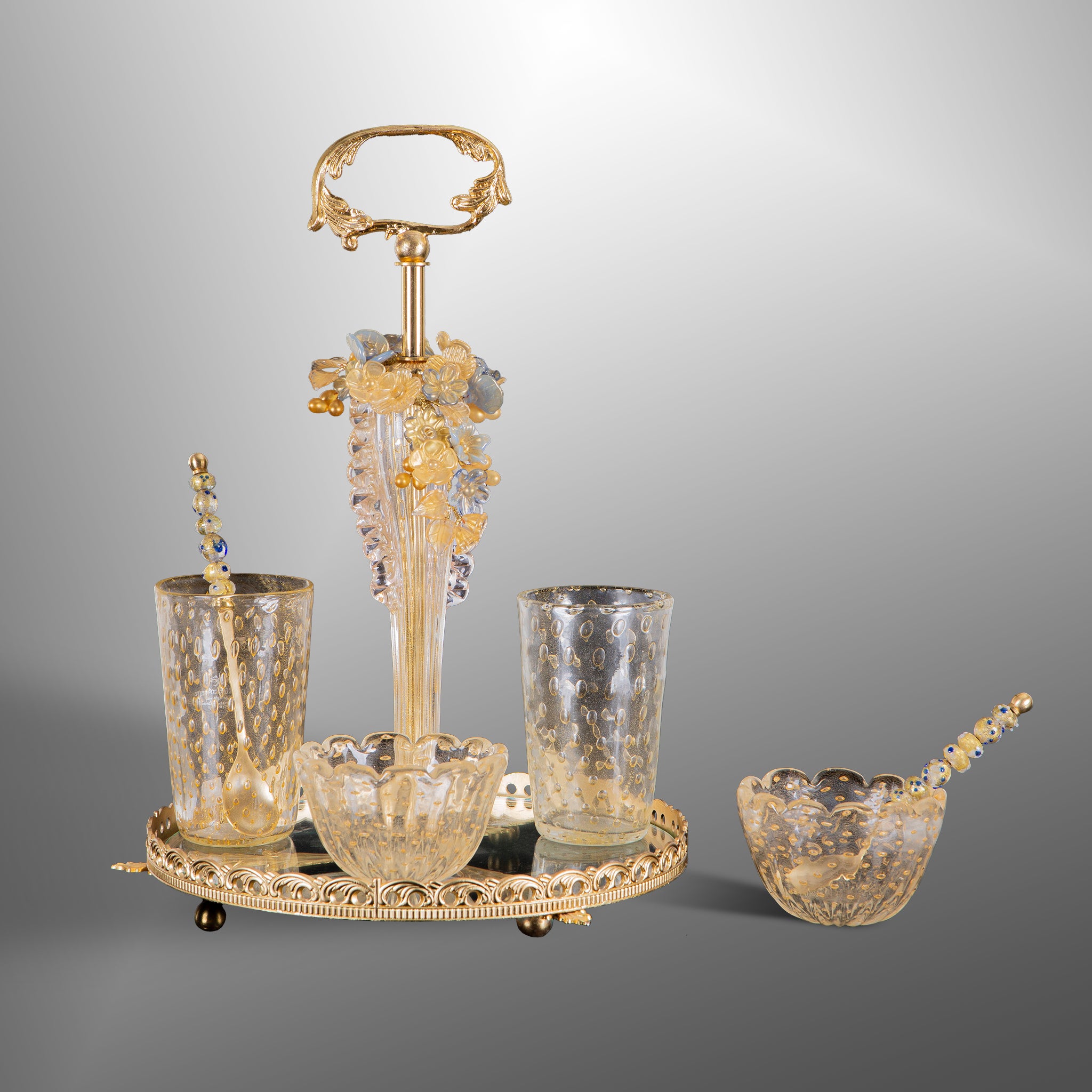 Brass tray with glasses, bowls and teaspoons
