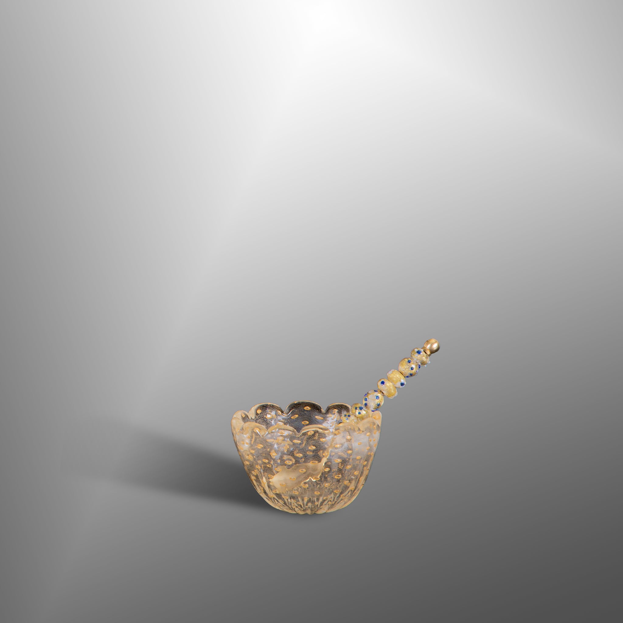 Brass tray with glasses, bowls and teaspoons