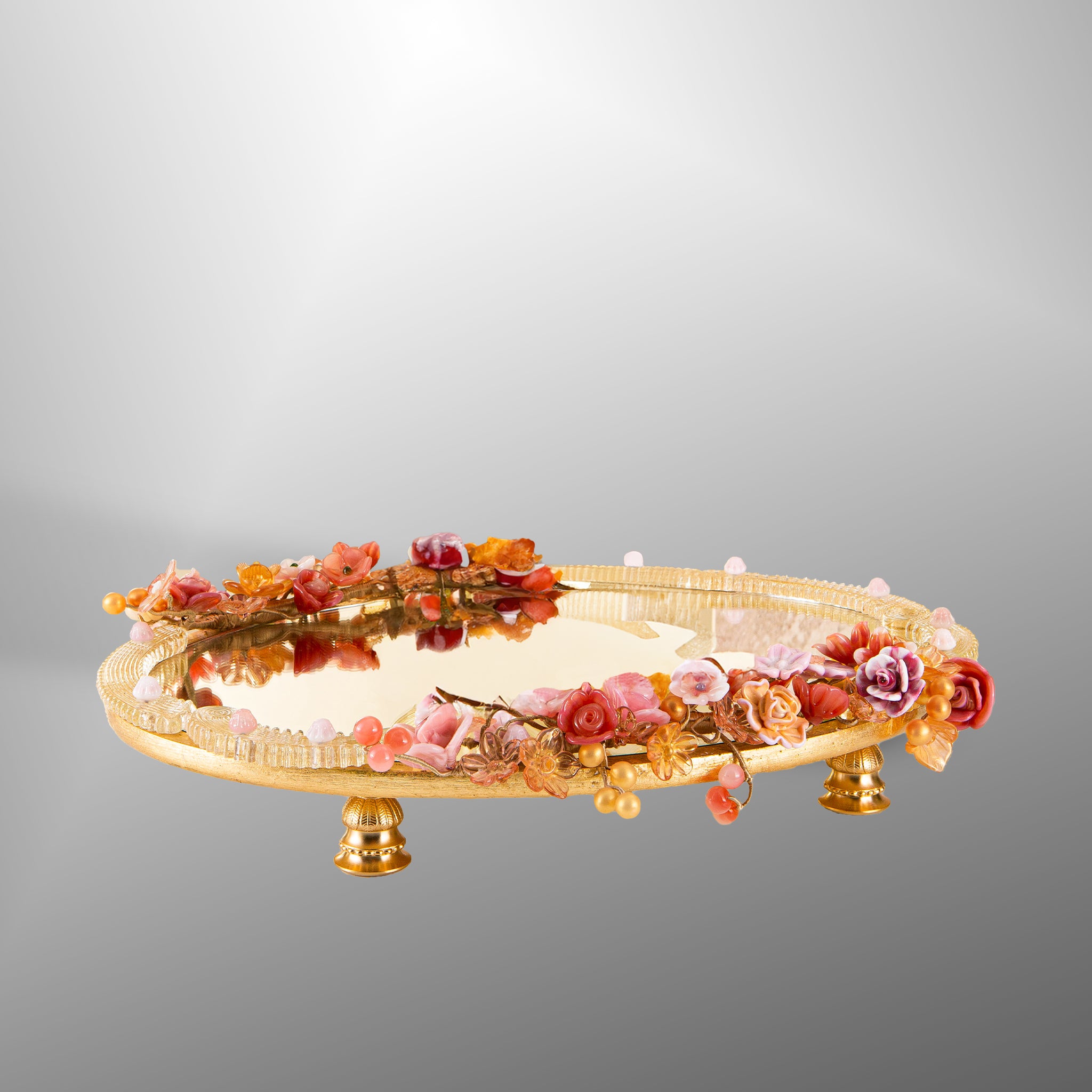 Ambient parfume bottle in gold with flowers