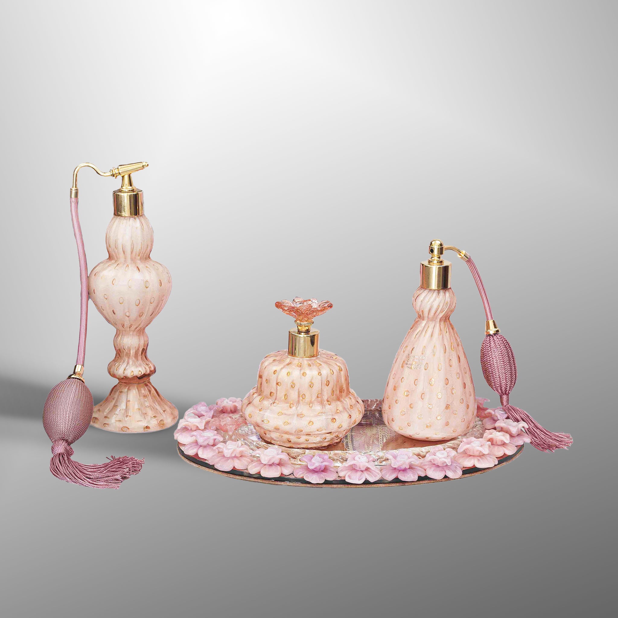 Bottiglie di profumo Rosa "incamiciato"